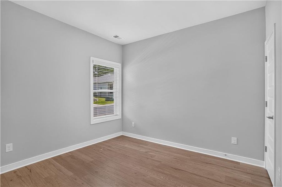 Spacious, unfurnished interior of a new home in The Cottages at East Lanier, Fayetteville (Image 9).