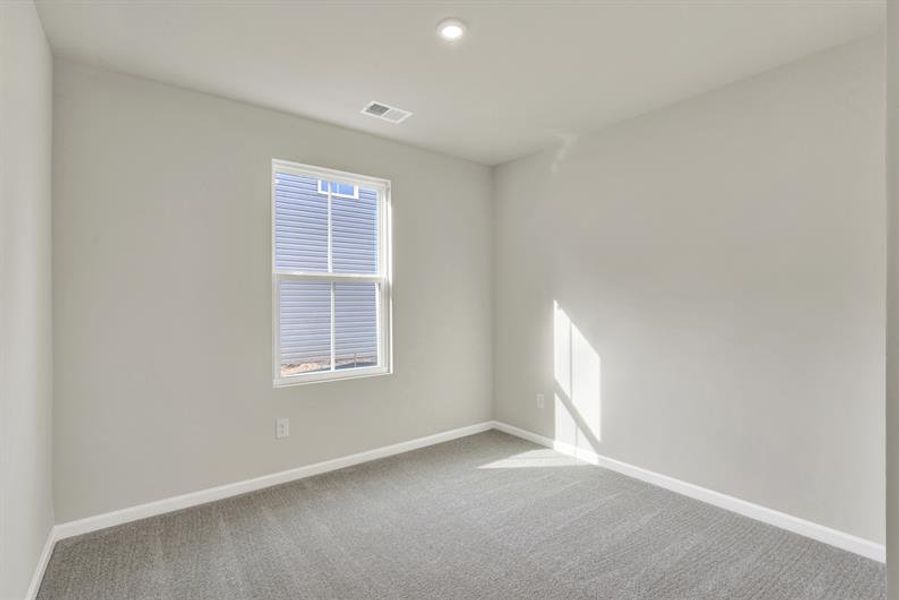 Spacious, unfurnished interior of a new home in Royal Oaks Cottages, Hardeeville (Image 14).