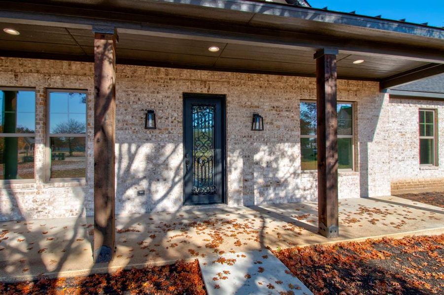 Property entrance with a porch