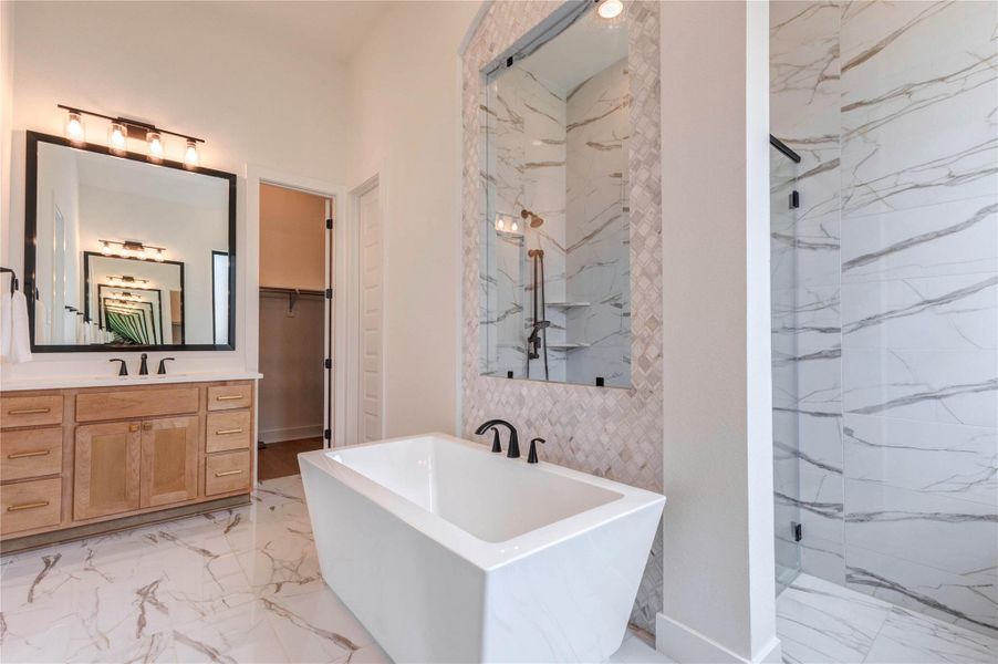 This modern bathroom features a spacious vanity with ample storage, elegant fixtures, and a large frosted window for natural light and privacy. The sleek design is complemented by marble-like flooring, creating a clean and inviting space. This modern bathroom features a spacious vanity with ample storage, elegant fixtures, and a large frosted window for natural light and privacy. The sleek design is complemented by marble-like flooring, creating a clean and inviting space.