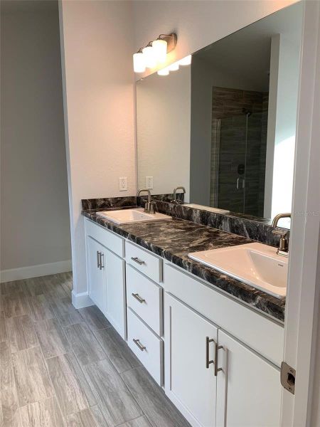 Furnished interior view inside a new home in Twisted Oaks, Beverly Hills (Image 6). Furnished interior view inside a new home in Twisted Oaks, Beverly Hills (Image 6).