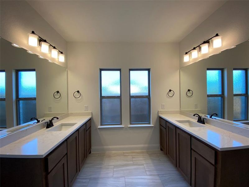 Separate vanities with Raphael Quartz counters Separate vanities with Raphael Quartz counters