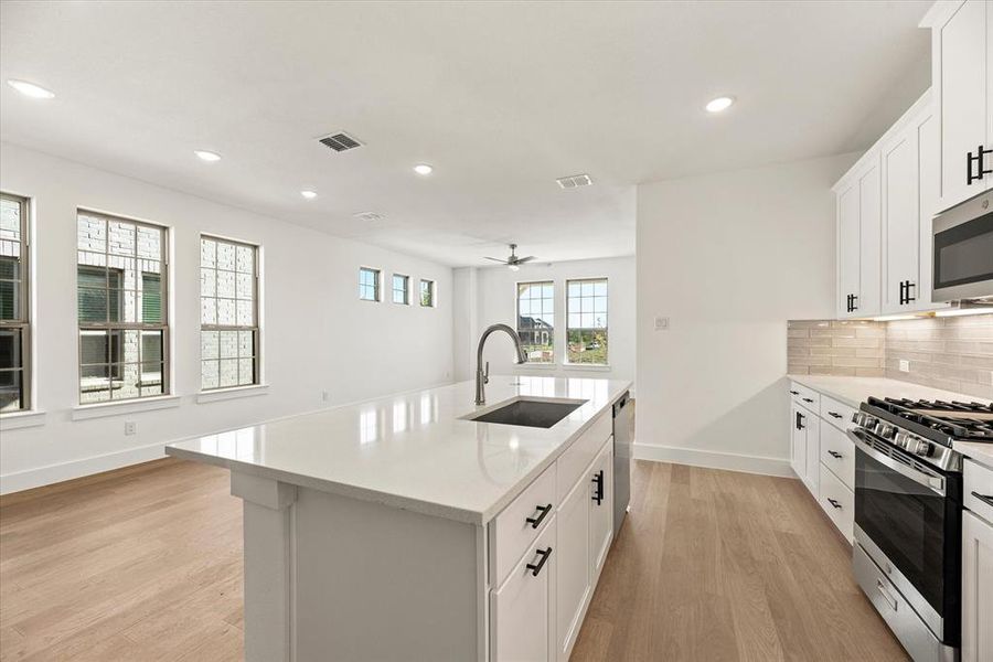 The chef will love being the center of attention in this gorgeous kitchen!