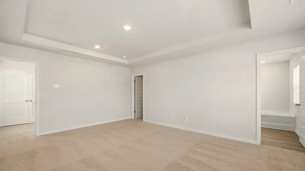 Representative unfurnished interior of a home built from the Somerset by D.R. Horton in Branford Crossing, Stockbridge (Image 23).