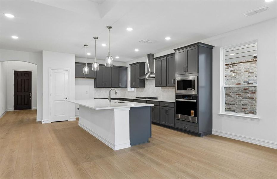 Beautiful kitchen with eat-in bartop island
