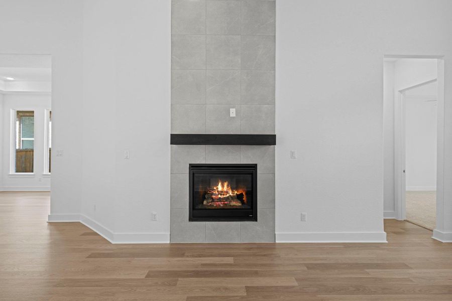 Family Room with soaring ceiling & fireplace Family Room with soaring ceiling & fireplace