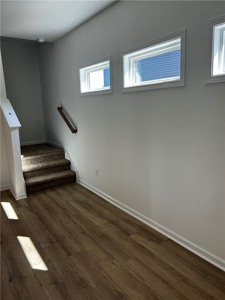 This bright hallway connects spaces with clean lin
