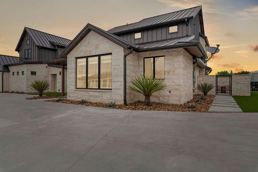 Front exterior of a new home in , Iredell, TX, highlighting curb appeal (Image 21).