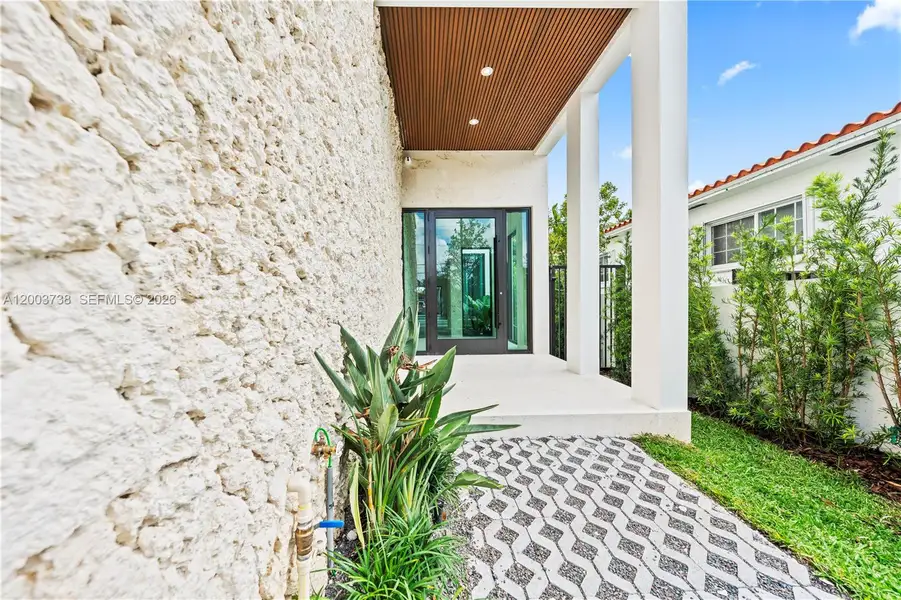 Exterior details and patio area of a home in , Miami (Image 26).