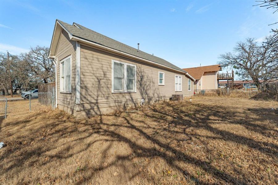 Exterior details and patio area of a home in , Stephenville (Image 3).