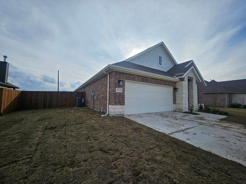 Exterior details and patio area of a home in Aero Vista, Caddo Mills (Image 3).