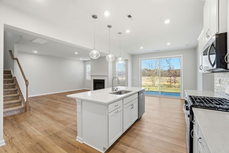 Furnished interior view inside a new home in Waxhaw Landing, Monroe (Image 6).