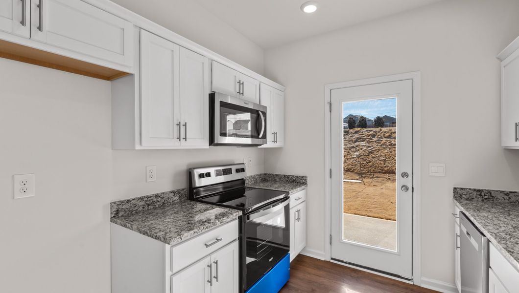 Furnished interior view inside a new home in Tanglewood Townes, Greenville (Image 6).
