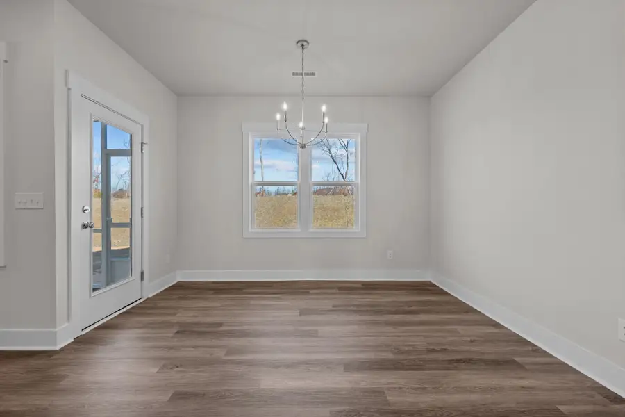 Representative unfurnished interior of a home built from the Raindrops on Roses by Garman Homes in McConnell Ridge, McLeansville (Image 11).