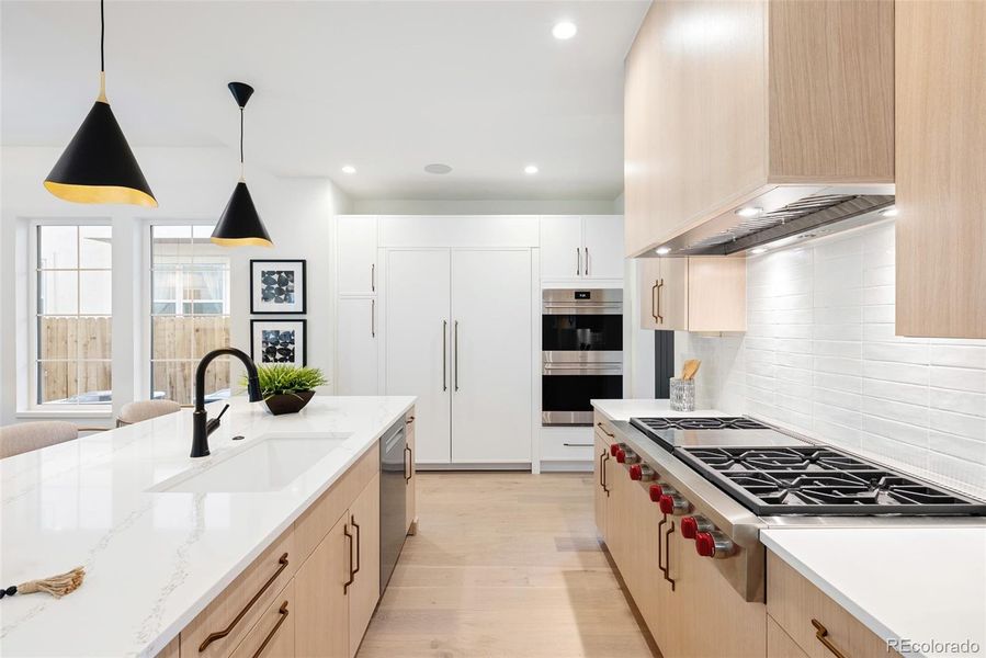 Natural elements warm the light-infused spaces