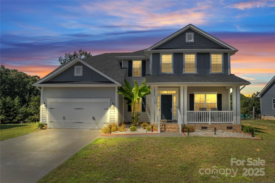 Front exterior of a new home in , Locust, NC, highlighting curb appeal (Image 20).