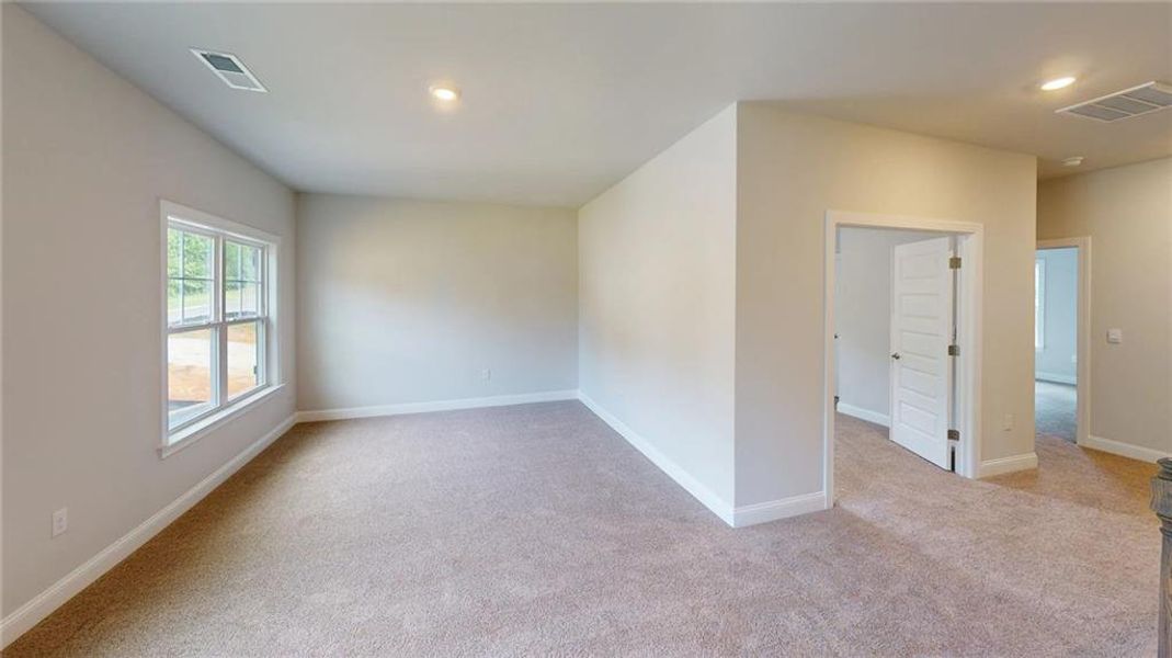 Spacious, unfurnished interior of a new home in Mirror Lake at South Harbour, Villa Rica (Image 22).