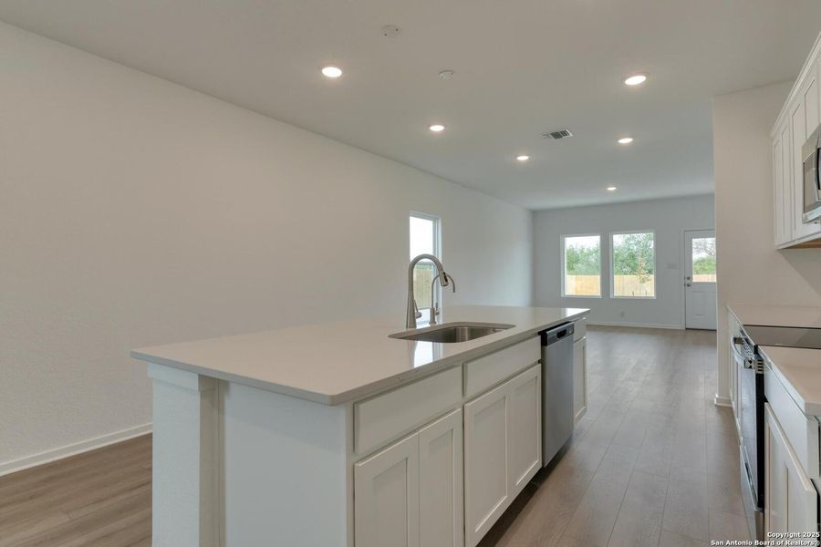 Furnished interior view inside a new home in Meadows at Hennersby Hollow 40's, San Antonio (Image 13).