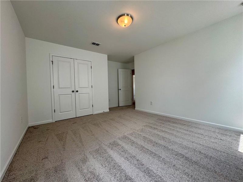 Spacious, unfurnished interior of a new home in Eastlyn Crossing - Single Family, Flowery Branch (Image 31). Spacious, unfurnished interior of a new home in Eastlyn Crossing - Single Family, Flowery Branch (Image 31).
