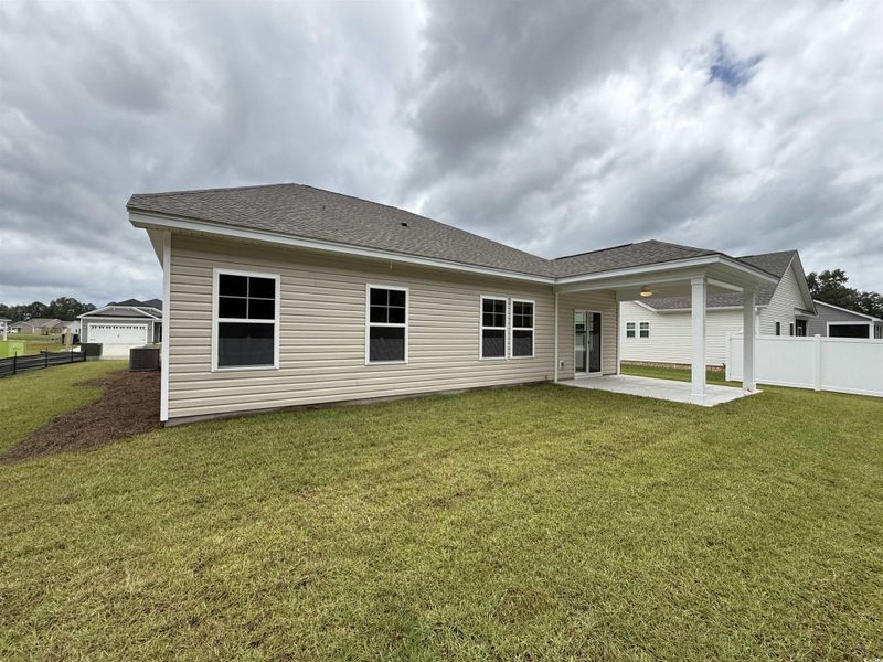 Front exterior of a new home in Beach Gardens, Conway, SC, highlighting curb appeal (Image 16).