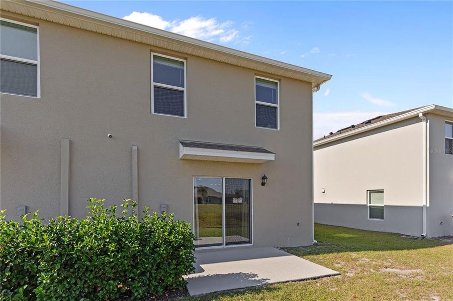 Exterior details and patio area of a home in Harmony West, St. Cloud (Image 3).