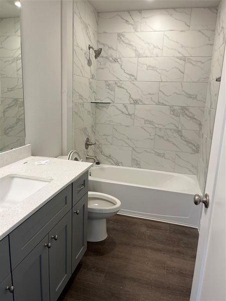 The same timeless bathroom style as downstairs, and plenty of counter space!