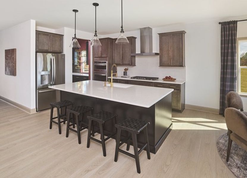 Representative furnished interior of a home built from the Benson by Ashton Woods in The Point, Rolesville (Image 6).