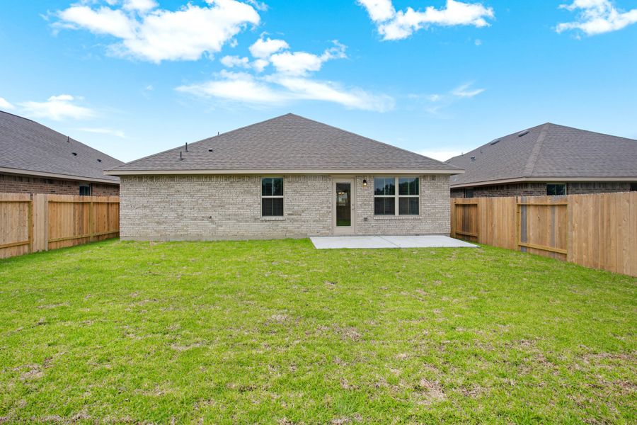 Front exterior of a new home in Bayou Maison, Dickinson, TX, highlighting curb appeal (Image 19).