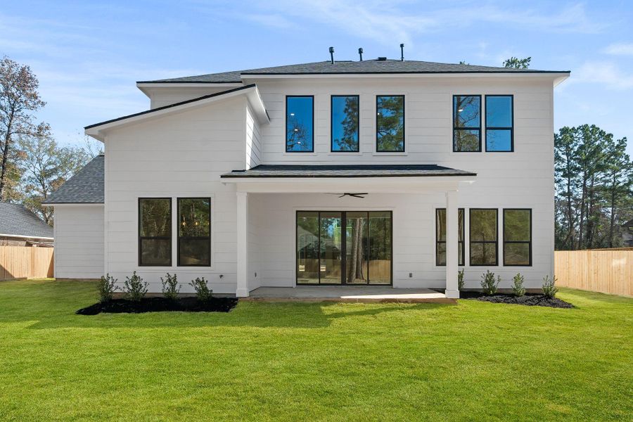 Exterior details and patio area of a home in , Magnolia (Image 3). Exterior details and patio area of a home in , Magnolia (Image 3).