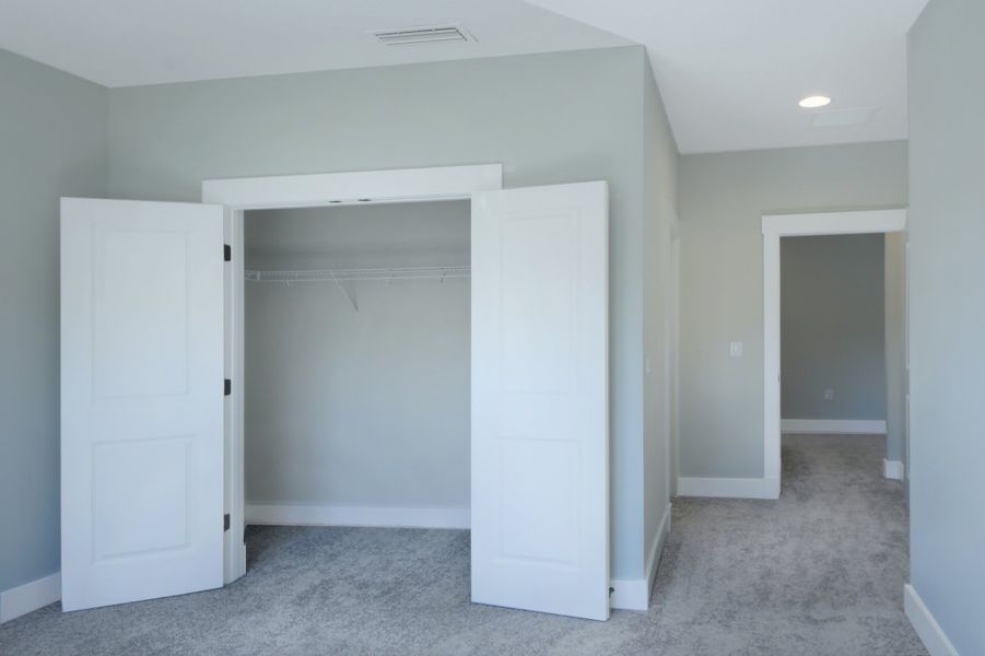 Representative unfurnished interior of a home built from the Julington by Riverside Homes in Hidden Creek at SilverLeaf 70' Series, St. Augustine (Image 13).