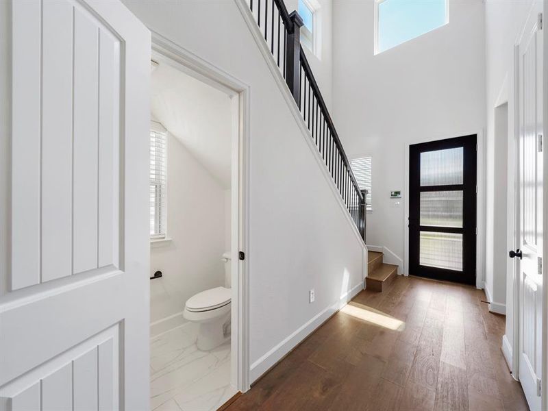 The Powder Bath is conveniently located near the entry way and kitchen for added convivence! (Sample photos of a completed Warwick floor plan. The image may feature alternative selections and/or upgrades.)