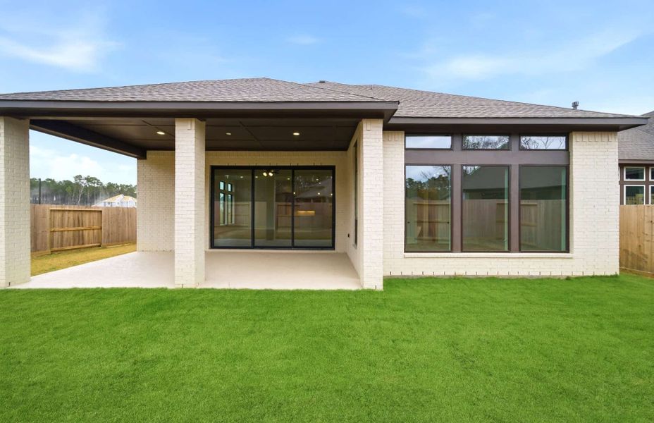 Exterior details and patio area of a home in The Highlands 55′, Porter (Image 4).