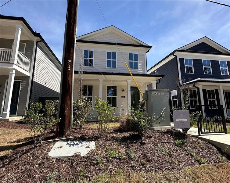 Front exterior of a new home in , Auburn, GA, highlighting curb appeal (Image 23).