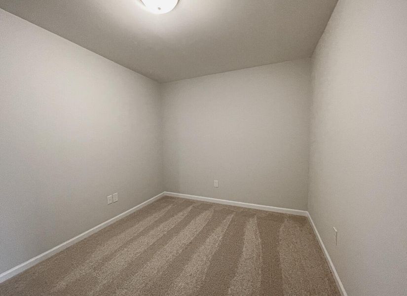 Spacious, unfurnished interior of a new home in East Main Townes, Spartanburg (Image 19).