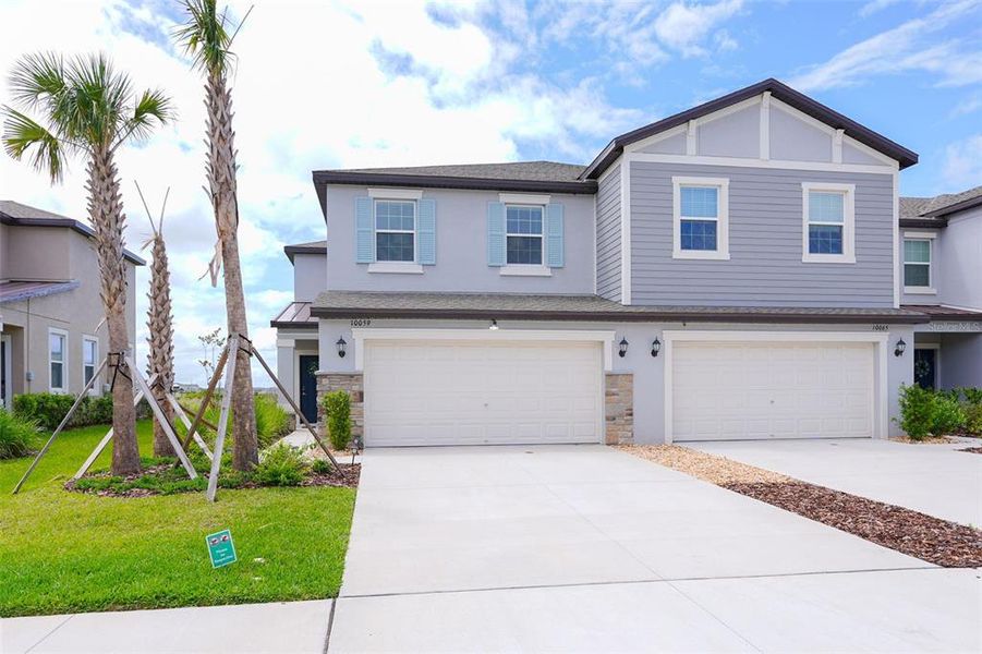 Front exterior of a new home in , San Antonio, FL, highlighting curb appeal (Image 25).