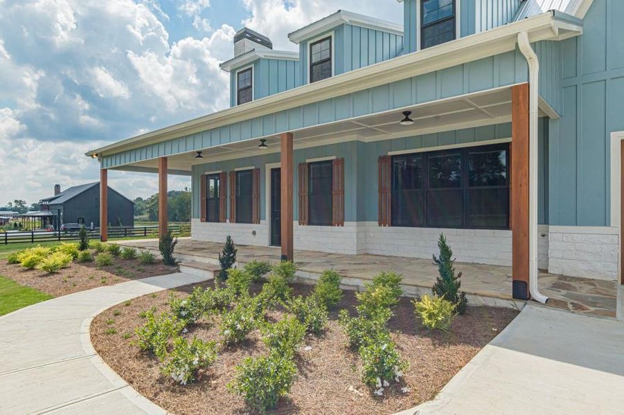 Front exterior of a new home in , Bremen, GA, highlighting curb appeal (Image 22).