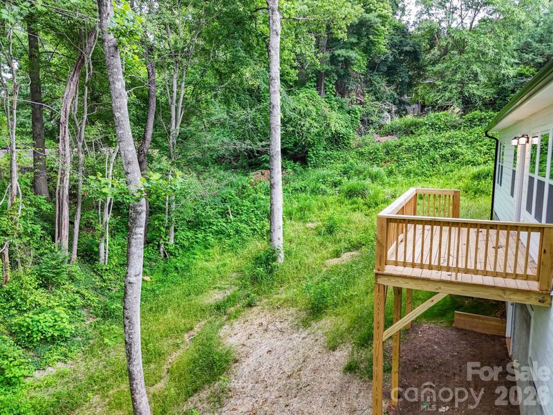 Exterior details and patio area of a home in , Black Mountain (Image 27). Exterior details and patio area of a home in , Black Mountain (Image 27).