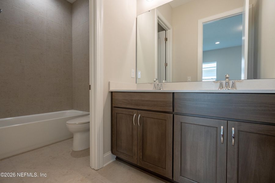 Furnished interior view inside a new home in SilverLeaf, St. Augustine (Image 17).