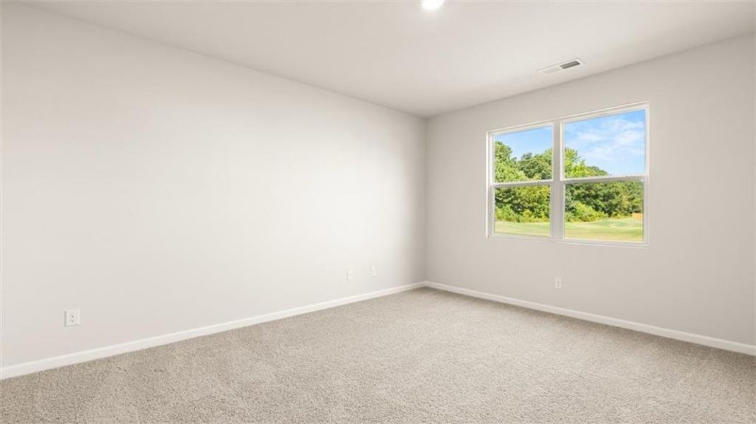 Spacious, unfurnished interior of a new home in Preserve at Dove Creek, Statham (Image 22).