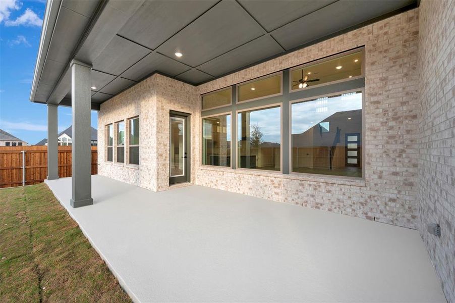 Exterior details and patio area of a home in Terraces – Estates, Rockwall (Image 21).