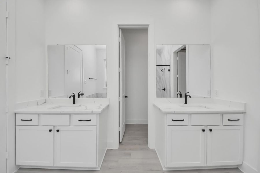 Representative furnished interior of a home built from the Summerton by Chesmar Homes in Meridiana 50's and 60's, Manvel (Image 38).