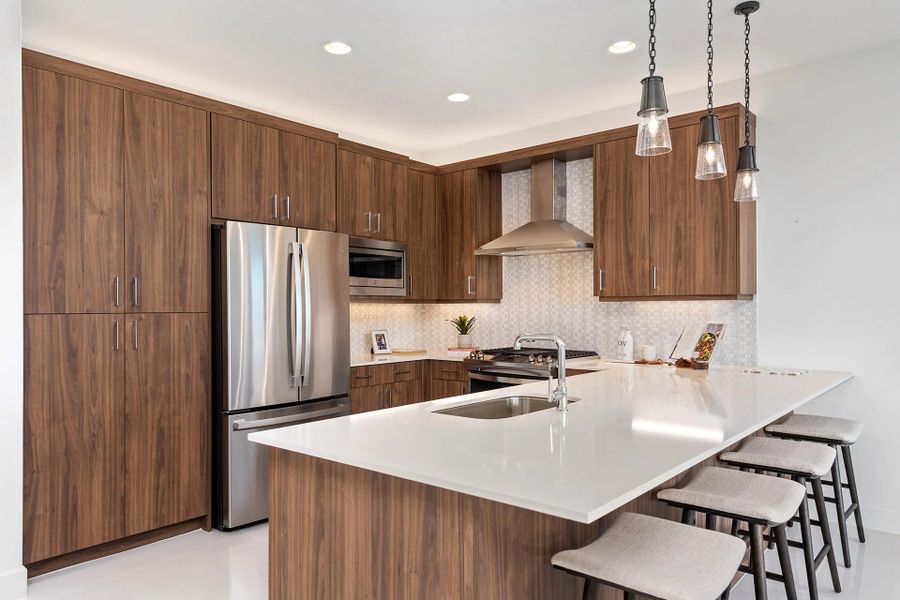 Furnished interior view inside a new home in Valencia Parc at Riverland, Port St. Lucie (Image 10).