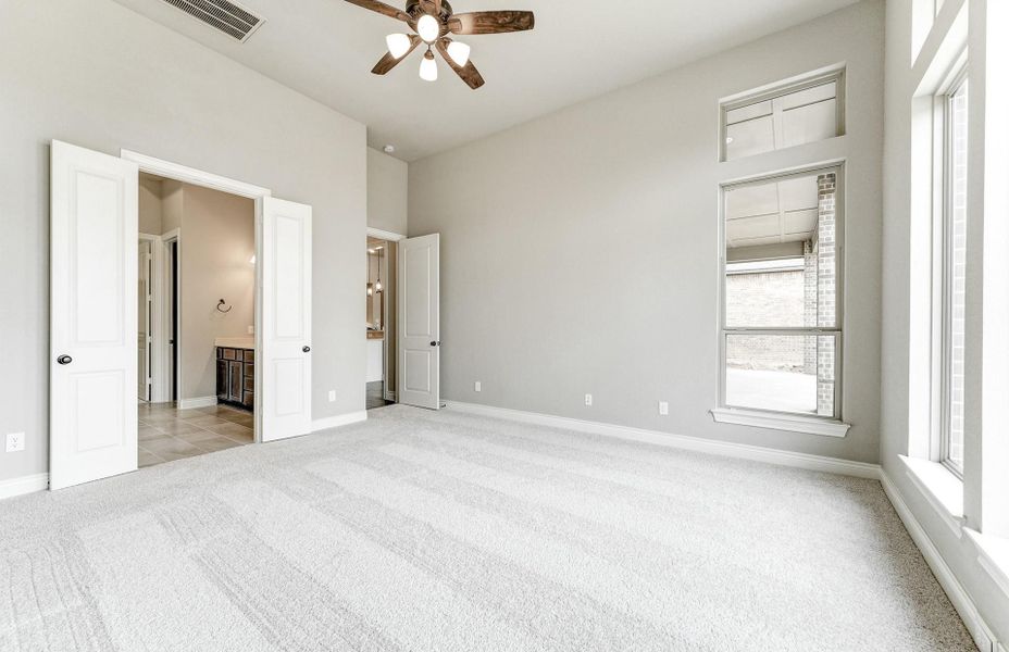Spacious, unfurnished interior of a new home in The Woodlands Hills 65′, Willis (Image 38).