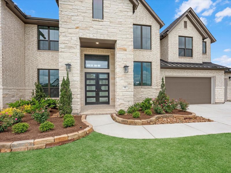 Exterior details and patio area of a home in The Estates at James Lane, Fulshear (Image 3).