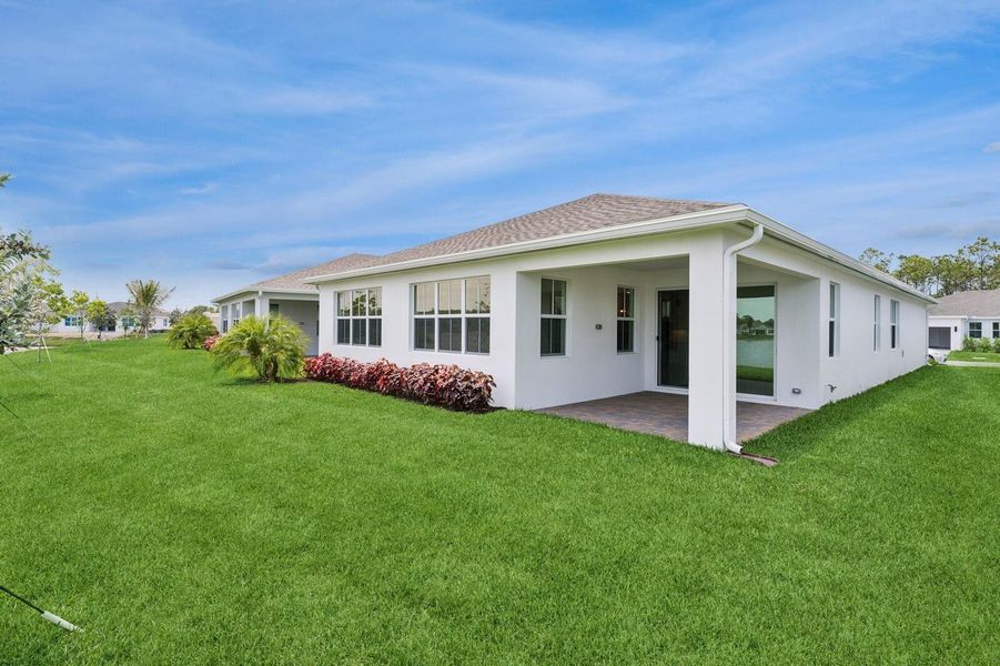 Front exterior of a new home in , Port St. Lucie, FL, highlighting curb appeal (Image 23). Front exterior of a new home in , Port St. Lucie, FL, highlighting curb appeal (Image 23).