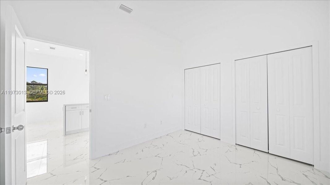 Spacious, unfurnished interior of a new home in , Lehigh Acres (Image 14).