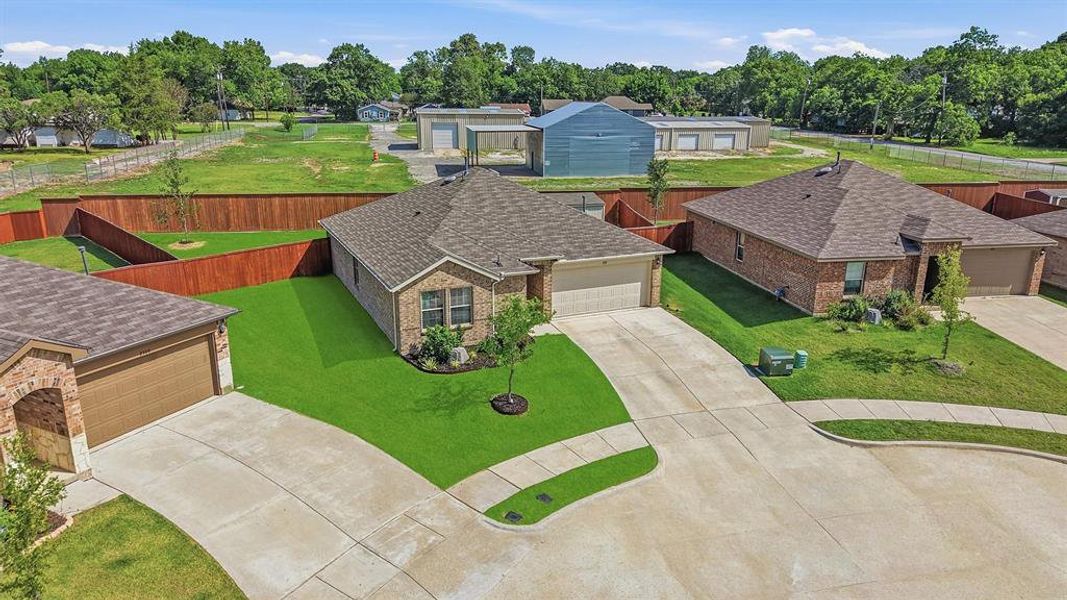 Front exterior of a new home in Three Oaks, Sherman, TX, highlighting curb appeal (Image 24).