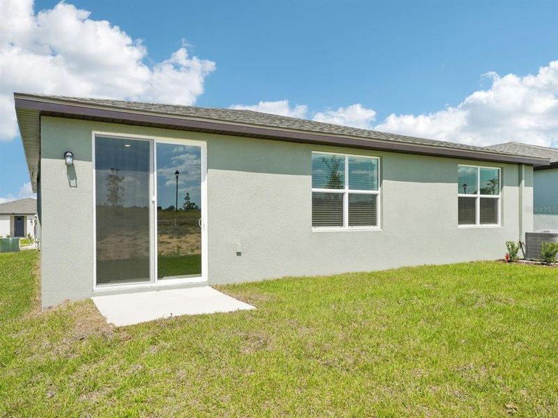 Exterior details and patio area of a home in Benton Hills - Classic Series, Brooksville (Image 21).