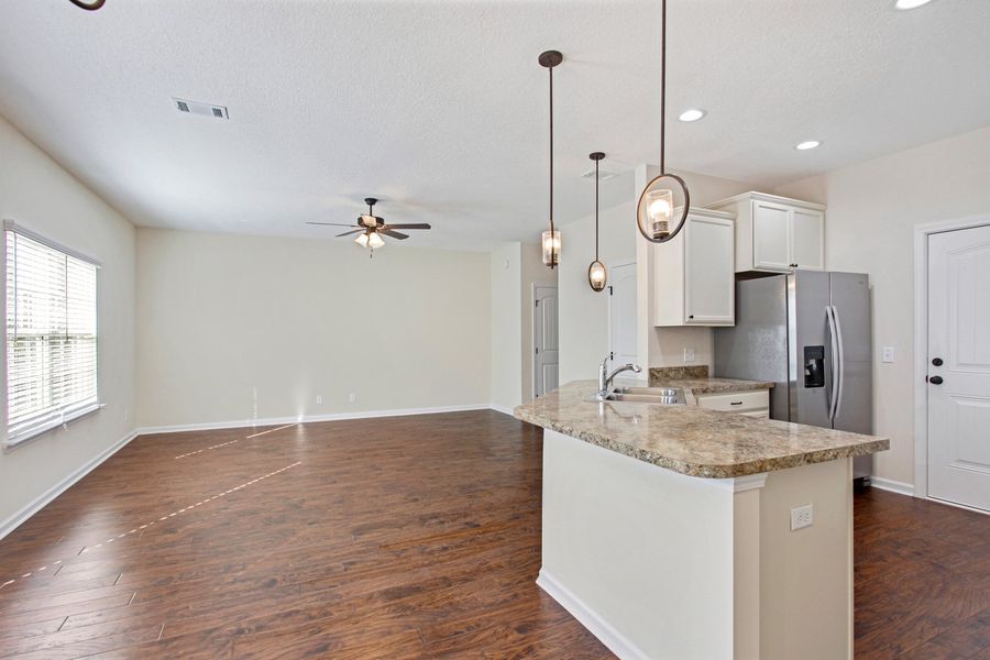 Representative furnished interior of a home built from the The Stacy by RTS Homes in Grand Reserve, Hinesville (Image 7).