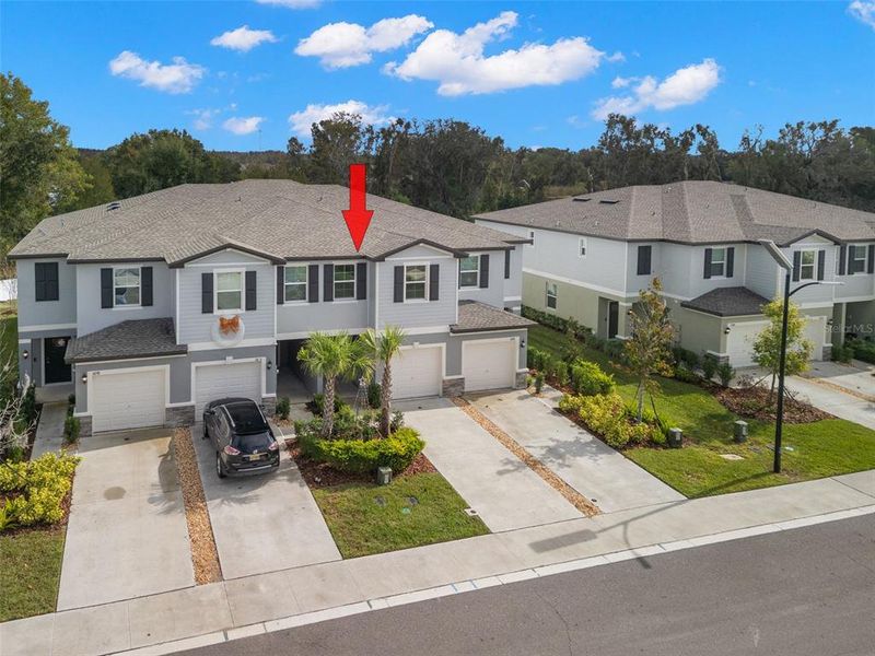 Front exterior of a new home in , Land O' Lakes, FL, highlighting curb appeal (Image 28). Front exterior of a new home in , Land O' Lakes, FL, highlighting curb appeal (Image 28).